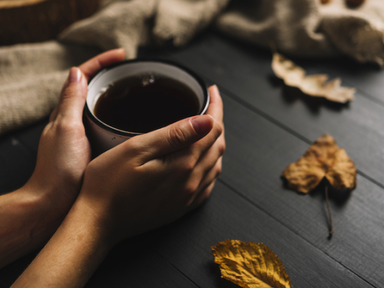 /media/dbafez2f/ritual_crop-hands-holding-mug-near-leaves_freepik